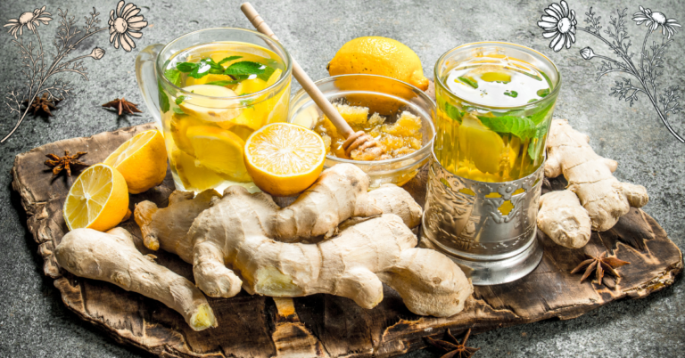 Fresh ginger root, sliced lemons, honey, and herbal tea displayed on a rustic wooden board, showcasing natural ingredients for promoting herbal health and wellness.